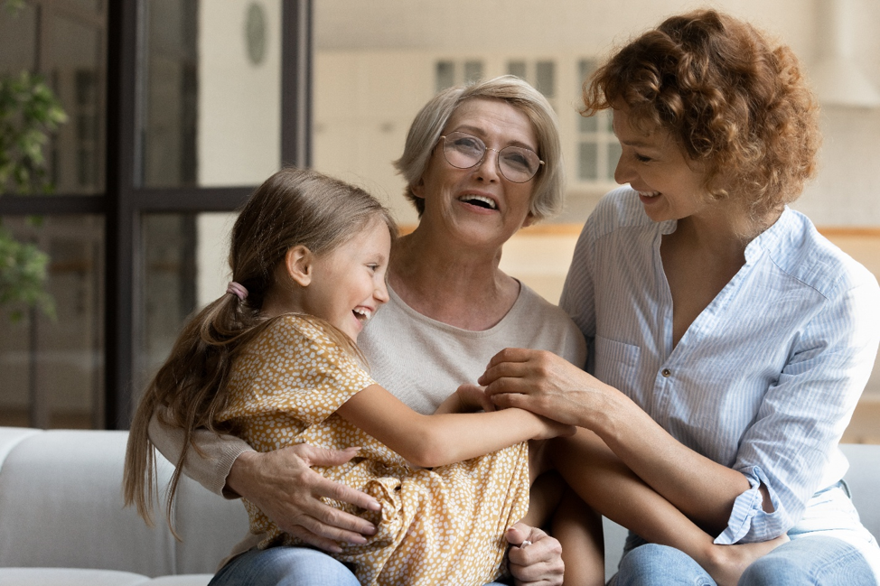 grandmother enjoying time with daughter and granddaughter